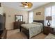 Comfortable bedroom with ceiling fan, carpet, and good natural light through white framed window at 4014 Peeler Ct, Rolesville, NC 27571