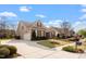 Beautiful home showcasing a well-maintained lawn, spacious driveway, and attached garage at 4014 Peeler Ct, Rolesville, NC 27571