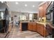 Bright kitchen featuring granite countertops, modern appliances, and breakfast area at 4014 Peeler Ct, Rolesville, NC 27571