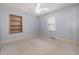 Bedroom featuring carpeted floors, neutral walls, ceiling fan, and natural light at 410 E Mcneill St, Lillington, NC 27546