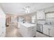 Bright kitchen featuring marble countertops, modern appliances, and a double island at 410 E Mcneill St, Lillington, NC 27546