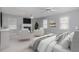 Spacious main bedroom with neutral tones and a fireplace, providing a relaxing and comfortable atmosphere at 410 E Mcneill St, Lillington, NC 27546