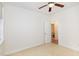 This bedroom features neutral carpet, a ceiling fan, and an ensuite bathroom at 430 Easy Wind Ln, Garner, NC 27529