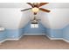 Bonus room featuring vaulted ceilings, three fans, and carpeted flooring at 430 Easy Wind Ln, Garner, NC 27529