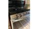 Close up of the glass top oven and stainless steel handles at 430 Easy Wind Ln, Garner, NC 27529