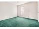 Spacious bedroom with a standard window and cozy green carpeted floors at 432 Fowlkes St, Wendell, NC 27591