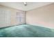 Open floor plan with a window and green carpet at 432 Fowlkes St, Wendell, NC 27591
