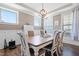 Elegant dining room with a large table, perfect for Gathering gatherings and formal dinners at 4913 Sunset Stream Dr, Fuquay Varina, NC 27526