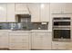 Modern kitchen featuring stainless steel appliances, gas cooktop, and plenty of cabinet storage at 4913 Sunset Stream Dr, Fuquay Varina, NC 27526