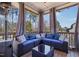 Covered patio with an outdoor seating area, plush cushions, and a gas heater at 4913 Sunset Stream Dr, Fuquay Varina, NC 27526