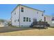 Exterior view of a two story home featuring a backyard deck and white siding at 505 Ferry Ct, Wake Forest, NC 27587