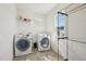 Well-lit laundry room with modern washer and dryer at 505 Ferry Ct, Wake Forest, NC 27587
