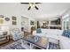 Bright and airy living room adjacent to the kitchen, featuring stylish furnishings and decor at 505 Ferry Ct, Wake Forest, NC 27587