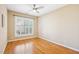 Bright bedroom with hardwood floors and plantation shutters, offering a serene retreat at 508 Spencer Crest Ct, Cary, NC 27513