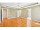 Primary bedroom boasting trey ceilings, multiple windows, and access to an ensuite bathroom and walk-in closet at 508 Spencer Crest Ct, Cary, NC 27513