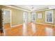 Primary bedroom featuring tray ceilings, ample windows, and an ensuite bathroom for added privacy at 508 Spencer Crest Ct, Cary, NC 27513