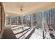 Screened porch with forest views, offering an airy space to enjoy nature at 508 Spencer Crest Ct, Cary, NC 27513