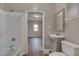 Updated bathroom featuring a vanity, toilet, and shower with nice light and flooring at 516 Craven Road, Durham, NC 27704
