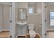 Neat bathroom with new fixtures, a modern vanity, and fresh paint at 516 Craven Road, Durham, NC 27704