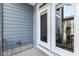 View of the back door and vinyl siding from the outside at 627 Balsam Fir Dr, Cary, NC 27519