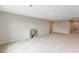 Basement area with neutral carpet, recessed lighting, and walls painted with neutral color at 627 Balsam Fir Dr, Cary, NC 27519