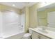 Bathroom features white vanity, toilet and shower-tub combo with chrome fixtures at 627 Balsam Fir Dr, Cary, NC 27519