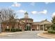 Community building features a cupola, traditional brick architecture, and well-maintained landscaping at 627 Balsam Fir Dr, Cary, NC 27519