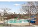 Resort-style community pool with waterslide and ample seating at 627 Balsam Fir Dr, Cary, NC 27519