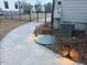 Paver walkway with low-voltage lighting leads through the backyard, past the AC unit at 664 The Parks Dr, Pittsboro, NC 27312