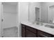 Bathroom featuring a vanity with a large sink and mirror, plus cabinet storage at 664 The Parks Dr, Pittsboro, NC 27312