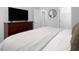 Bedroom showcasing a dresser with a TV on top, and a neutral decor scheme at 664 The Parks Dr, Pittsboro, NC 27312