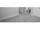 Bedroom featuring neutral carpeting and access to an en suite bathroom at 664 The Parks Dr, Pittsboro, NC 27312