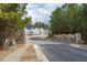 A well-maintained neighborhood street lined with beautiful homes and mature trees, great for walks and recreation at 664 The Parks Dr, Pittsboro, NC 27312