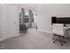 Bright office space with a desk, chair, and ample natural light from the windows at 664 The Parks Dr, Pittsboro, NC 27312