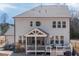 A lovely home featuring a screened porch and deck in the backyard for outdoor living and entertaining at 664 The Parks Dr, Pittsboro, NC 27312