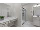 Bright bathroom with a modern shower, vanity with drawers, and a makeup vanity at 721 Sage Oak Ln, Holly Springs, NC 27540