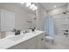 Bathroom with double sink vanity, and a shower/tub combo at 721 Sage Oak Ln, Holly Springs, NC 27540