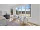 Bright bedroom featuring a sitting area with large windows offering scenic views at 7217 Manor Oaks Dr, Raleigh, NC 27615