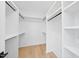 Spacious walk-in closet with ample shelving and hanging space for organization at 7217 Manor Oaks Dr, Raleigh, NC 27615