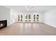 Bright living area with sliding doors leading to a patio and landscaped backyard at 7217 Manor Oaks Dr, Raleigh, NC 27615