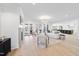 Bright, open living room with fireplace and french doors with outdoor access and views at 7217 Manor Oaks Dr, Raleigh, NC 27615