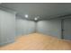 Spacious room with modern color palette and pot lights at 7217 Manor Oaks Dr, Raleigh, NC 27615