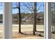 The window view of the lake and golf course as seen from the home at 7217 Manor Oaks Dr, Raleigh, NC 27615
