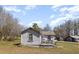 Charming single-story home with a small front porch and simple landscaping at 7534 Overhills Rd, Spring Lake, NC 28390