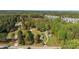 Beautiful wooded land outlined in red with mature trees on a desirable lot perfect for building at 7534 Overhills Rd, Spring Lake, NC 28390