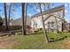 Spacious backyard featuring a stone patio and green yard perfect for activities and gatherings at 778 Cabin Branch Dr, Fuquay Varina, NC 27526