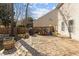 Spacious backyard patio featuring a textured stone surface and ample space for outdoor living at 778 Cabin Branch Dr, Fuquay Varina, NC 27526