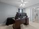 Bedroom featuring a large desk with dual monitors and a ceiling fan and closet space at 778 Cabin Branch Dr, Fuquay Varina, NC 27526