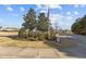 Well maintained community entrance with flagpole and manicured landscaping under a sunny sky at 778 Cabin Branch Dr, Fuquay Varina, NC 27526