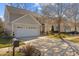 Lovely two-story home featuring a well-manicured lawn and a spacious two-car garage at 778 Cabin Branch Dr, Fuquay Varina, NC 27526